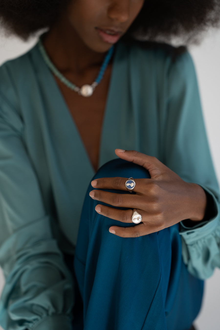 The Woman in Silver Signet Ring